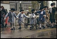 Kids brave the rain to march for Sechselauten
